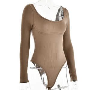 Macro detail of khaki ribbed cotton bodysuit with deep U-neckline and structural seams