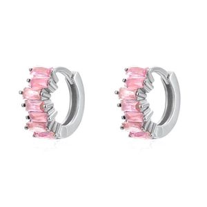 Close-up of silver earrings with pink rectangular zircon stones and hinged closure