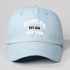 Detailed embroidery of Brooklyn New York text on light blue cotton baseball cap