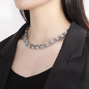 Polished silver stainless steel 15mm chunky chain necklace worn with a black blazer