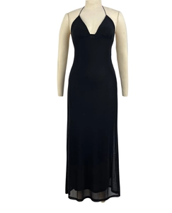 Detail of black halter neck mesh dress with deep V-neck and slim fit design