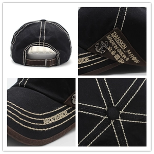 Detailed views of baseball cap showing anchor metal pendant and contrast stitching