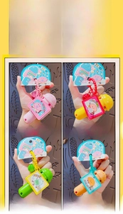 Detail of cute food-themed microphone keychains in pink, red, green and brown colors