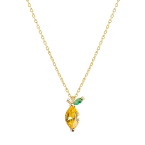 Detailed close-up of a gold lemon pendant necklace featuring yellow and green crystals