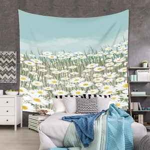 Detail of bohemian tapestry featuring daisy flower field pattern in a modern bedroom