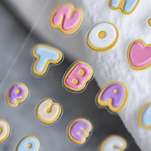 3D embossed 5D nail art stickers with pastel letters and golden glitter borders