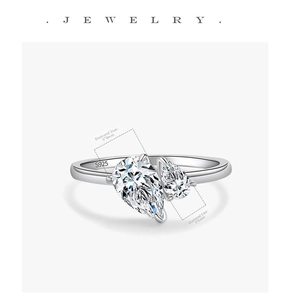 Close-up of S925 silver ring with double pear-cut crystals and hallmark detail