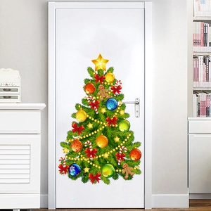 Colorful Christmas tree wall decal with ornaments and candy canes on a white door