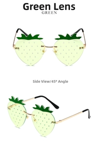 Detailed views of strawberry-shaped rimless sunglasses with green lenses and gold frame
