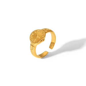 Detailed view of adjustable golden watch-shaped stainless steel ring with curb chain band