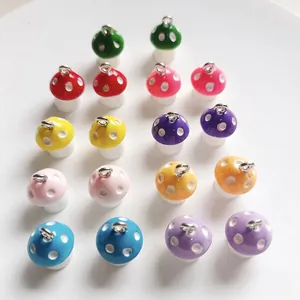 Set of colorful resin mushroom charms with white polka dots for DIY jewelry making