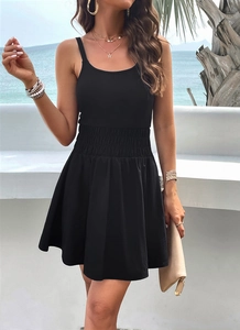Detail of elegant black A-line dress with ribbed knit bodice and elastic high waist