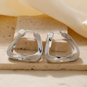 Modern silver U-shaped earrings with wave texture on a minimalist stone base