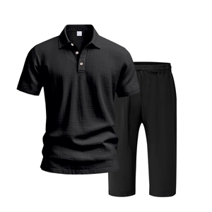 Detailed close-up of black breathable linen Polo shirt and trousers set texture
