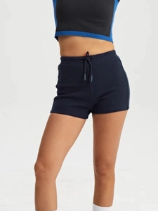 Women's high waist yoga shorts in dark blue with moisture-wicking athletic knit fabric