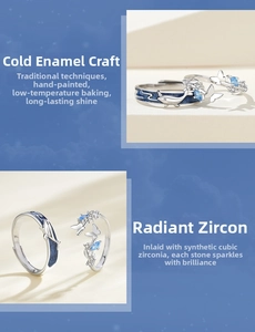 Detail view of silver whale and butterfly couple rings with blue enamel and zircon inlay
