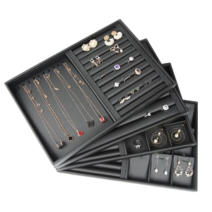 Stackable black PU leather jewelry trays for organizing rings, necklaces and earrings