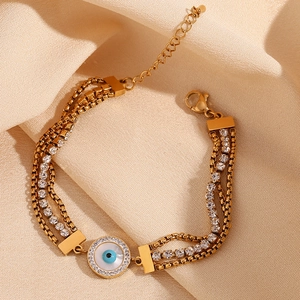 Triple-layer 18K gold plated stainless steel bracelet with blue evil eye and zircon charm