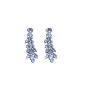 Elegant silver wheat leaf earrings with sparkling zircon crystals on white background
