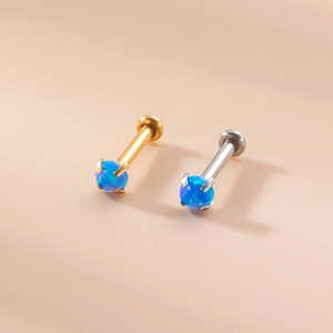 Detail of 16G stainless steel labret studs with 3mm blue opal inlay in gold and silver