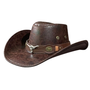Vintage brown leather western cowboy hat with metal bull head emblem and decorative badges