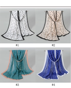 Detail showing sheer floral chiffon scarves in four colors with high translucency