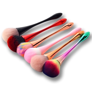 Set of 7 colorful makeup brushes with rainbow bristles and metallic waist handles