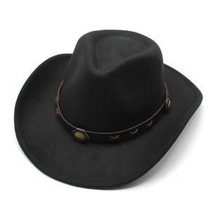 Detail of black felt cowboy hat featuring brown leather band with gold metal studs