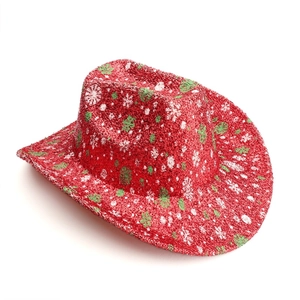 Sparkly red Western cowboy hat with white snowflake patterns and wide brim for Christmas