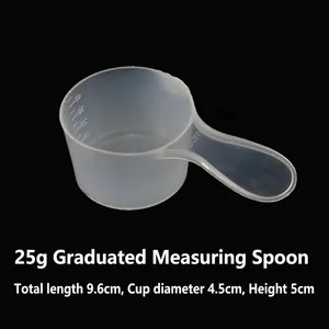 Macro view of a 50ml clear plastic measuring spoon with 10-40ml scale marks
