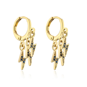 Detailed view of 18K gold plated lightning bolt earrings with blue zircon inlays