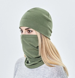 Detail of olive green fleece hat and neck warmer set worn by a model in winter