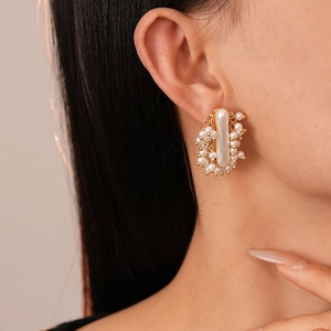 French vintage baroque pearl earrings with irregular geometric gold metal design