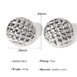 Detail view of silver stainless steel square stud earrings with quilted pattern design