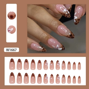 French leopard print press-on nails with white floral pattern and glossy pink base