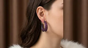 Vintage style sterling silver C-shaped hoop earrings with paved purple zircon stones