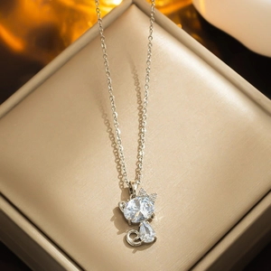 Sparkling pave diamond cute kitten necklace in silver stainless steel on jewelry box