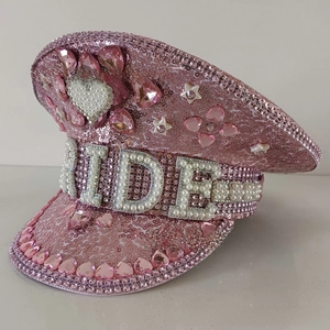 Pink sequin bride captain hat with pearl lettering and sparkling heart gemstone details