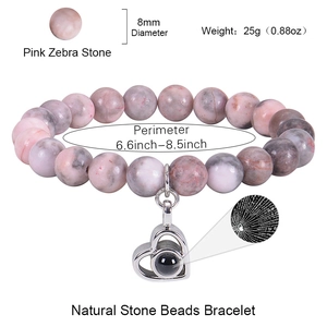 Pink zebra stone bead bracelet with 100 languages heart projection stone pendant