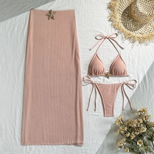 Pink three-piece bikini set with textured fabric and gold starfish details for summer vacations