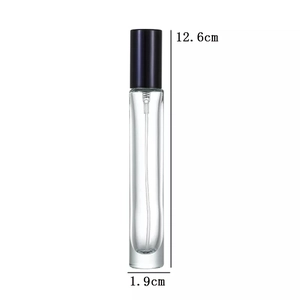 Macro view of a 10ml glass spray bottle with dimensions 12.6cm by 1.9cm and a black cap