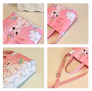 Detailed views of a pink kids unicorn crossbody bag with Lucky prints and adjustable strap