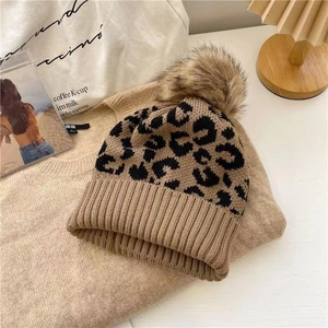 Women Leopard Print Knitted Beanie Hat With Faux Fur Pom-Pom Winter Warm Soft Polyester Fashion Skull Cap For Outdoors