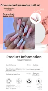 Detailed macro view of long ballet press-on nails with pink gradient and 3D white floral art