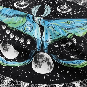 Macro detail showing the fabric texture and moon moth printing on this decorative tapestry