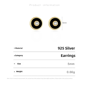 Detail showing 5mm gold S925 silver stud earrings with black enamel and zircon inlay