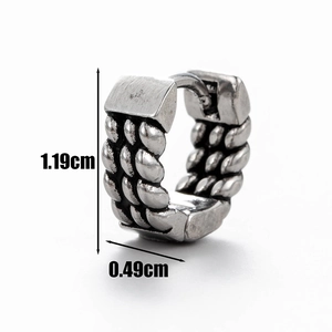 Detail shot of dragon totem earring showing 1.19cm diameter and 0.49cm width dimensions