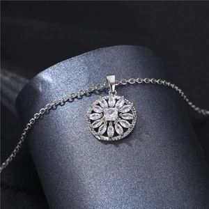 Elegant silver necklace featuring a sparkling round crystal pendant with cubic zirconia