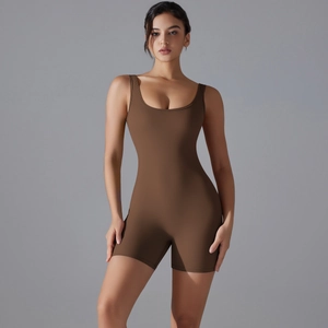 Detail of V-waist yoga bodysuit in dark brown showing seamless high elastic nylon fabric