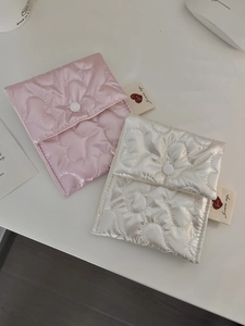 Quilted heart-pattern sanitary pouch set in pink and cream with elegant snap closure